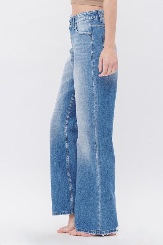 Cross Waist Band Jeans.