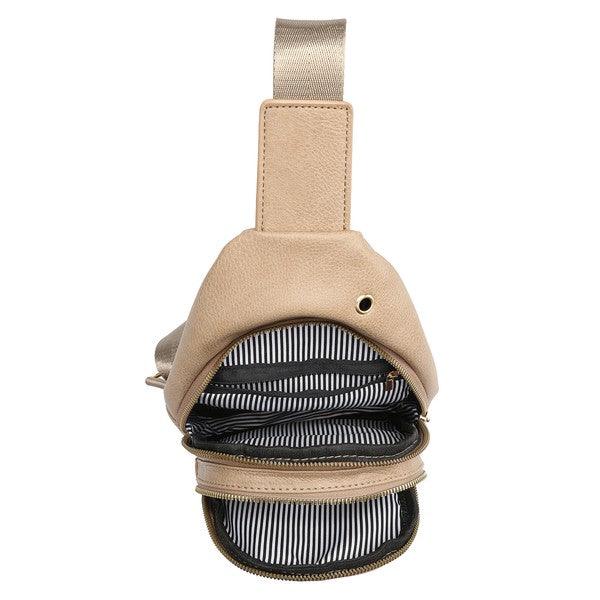 Faux Leather Sling Backpack.