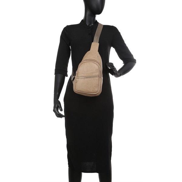 Faux Leather Sling Backpack.