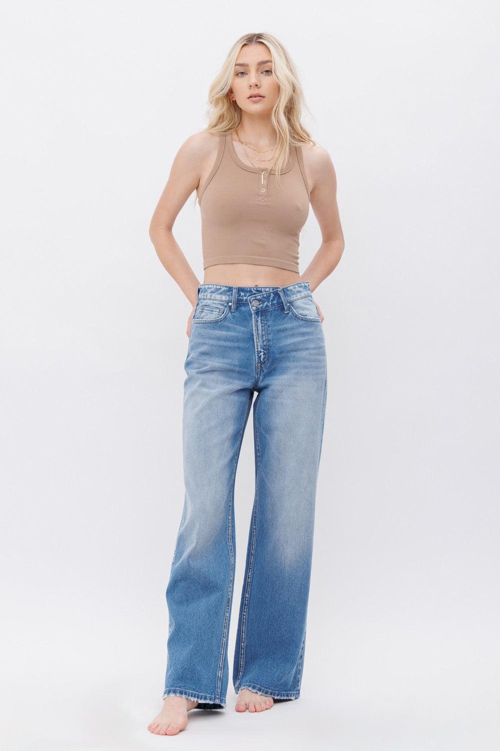 Cross Waist Band Jeans.