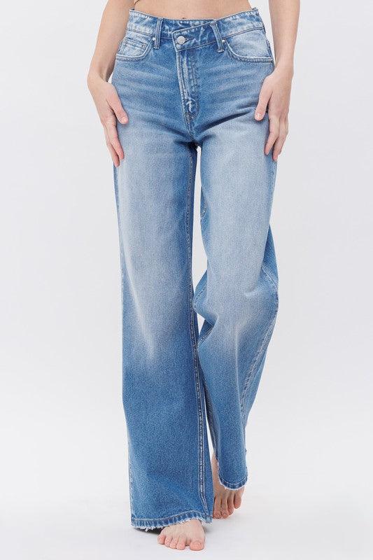 Cross Waist Band Jeans.