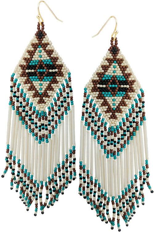 long seed bead Native American inspired fringe earrings in white brown and blue